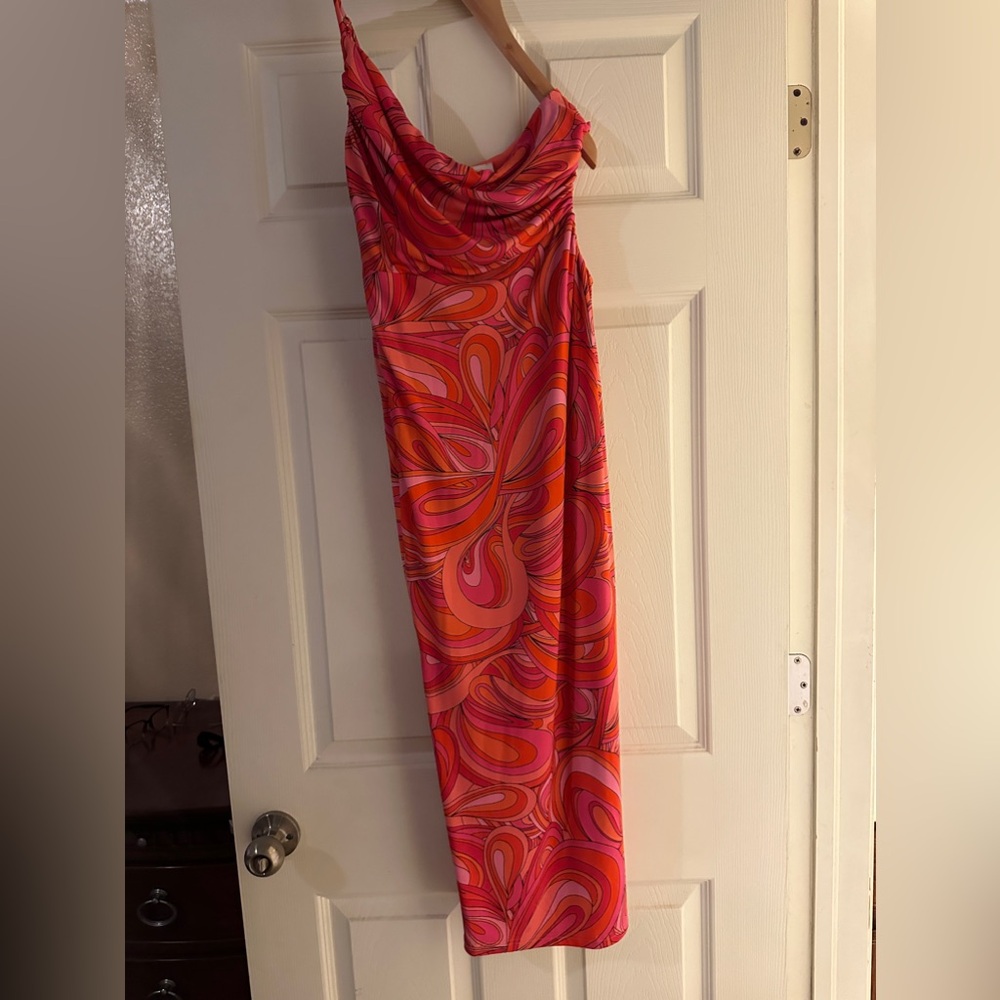One shoulder bodycon style dress. Oranges and pinks